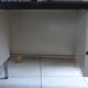 Industrial metal desk from the 70s with three drawers and glass top