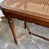 Piano bench in dark wood and cane