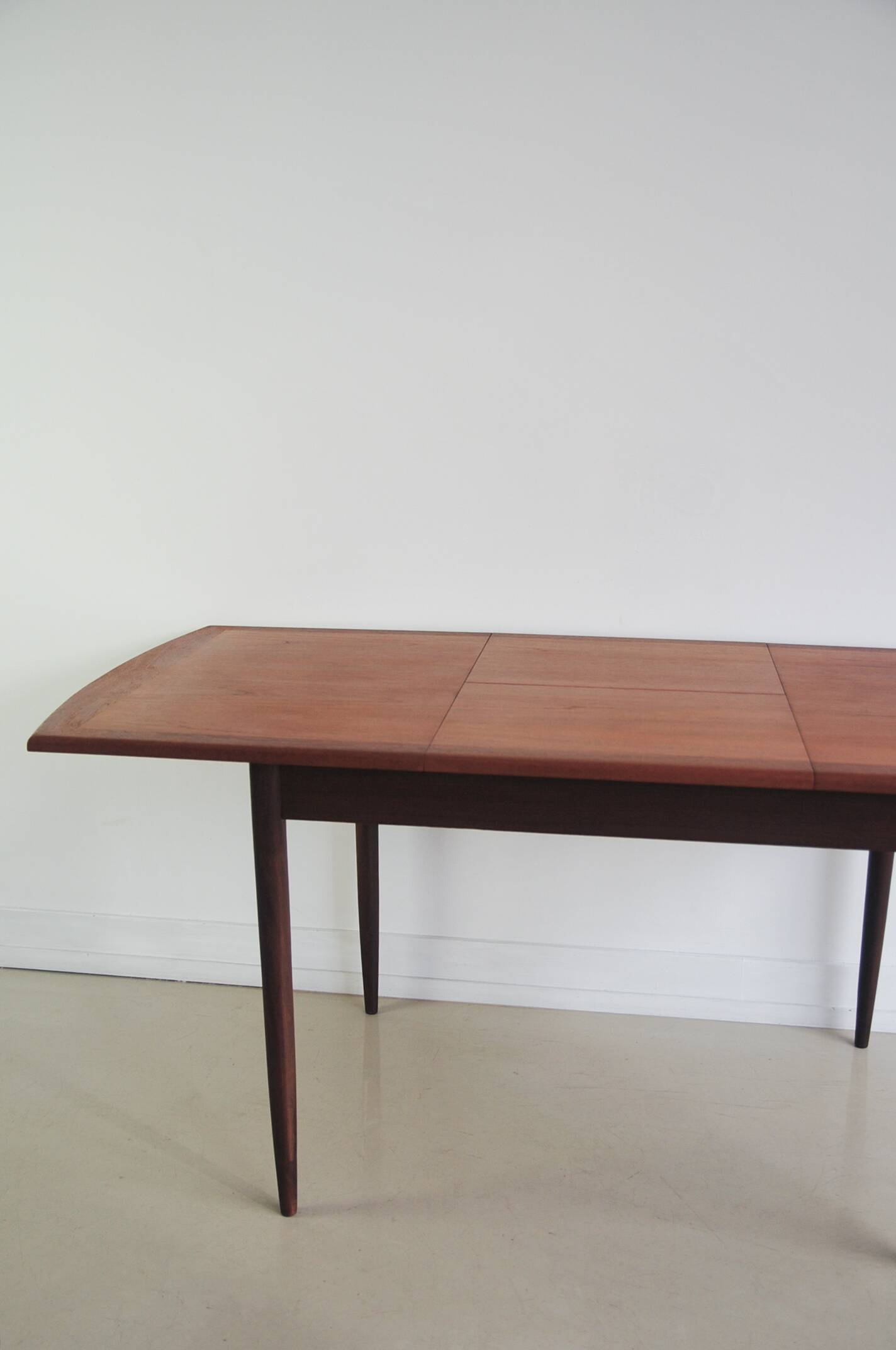 Folding teak dining table