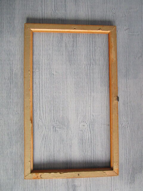 Old frame in worked wood