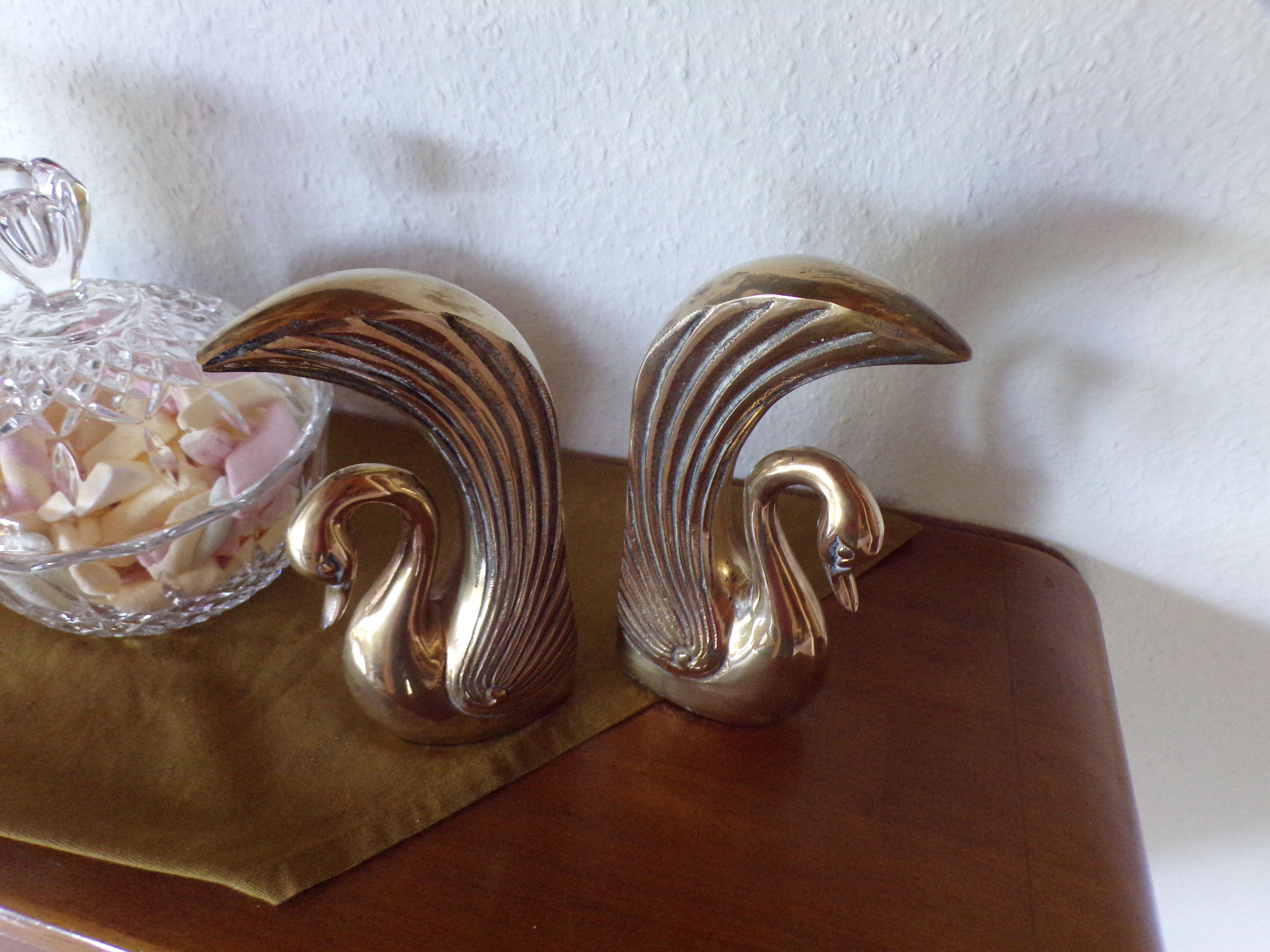 Pair of greenhouse books brass swans