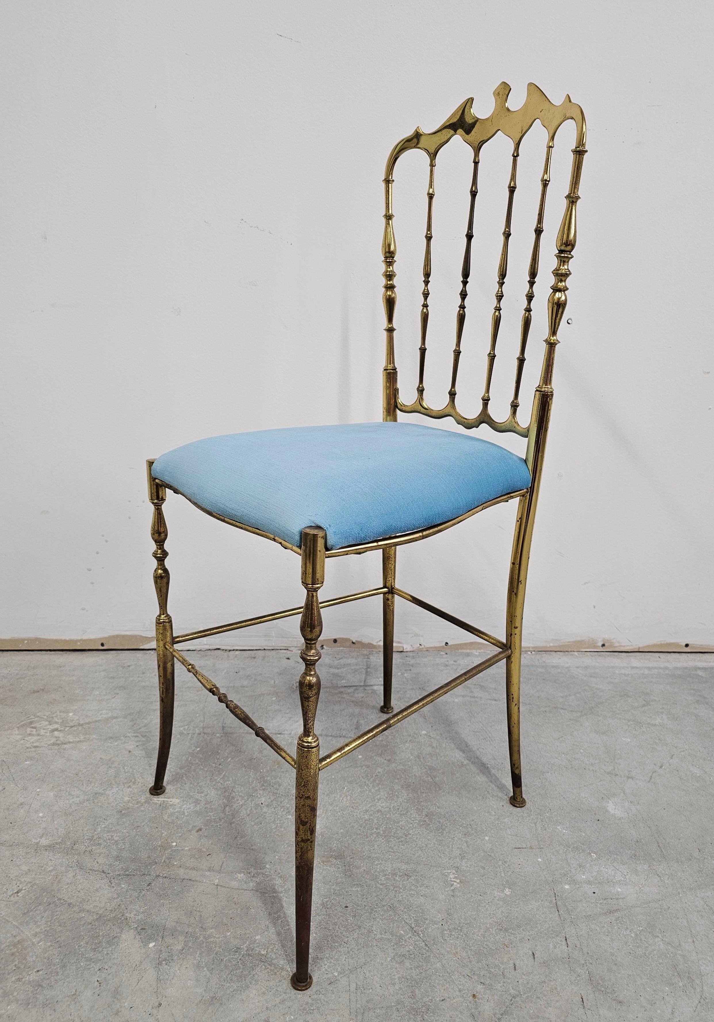 Mid-century Chiavari accent chair in solid brass with a plush seat.