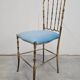 Mid-century Chiavari accent chair in solid brass with a plush seat.