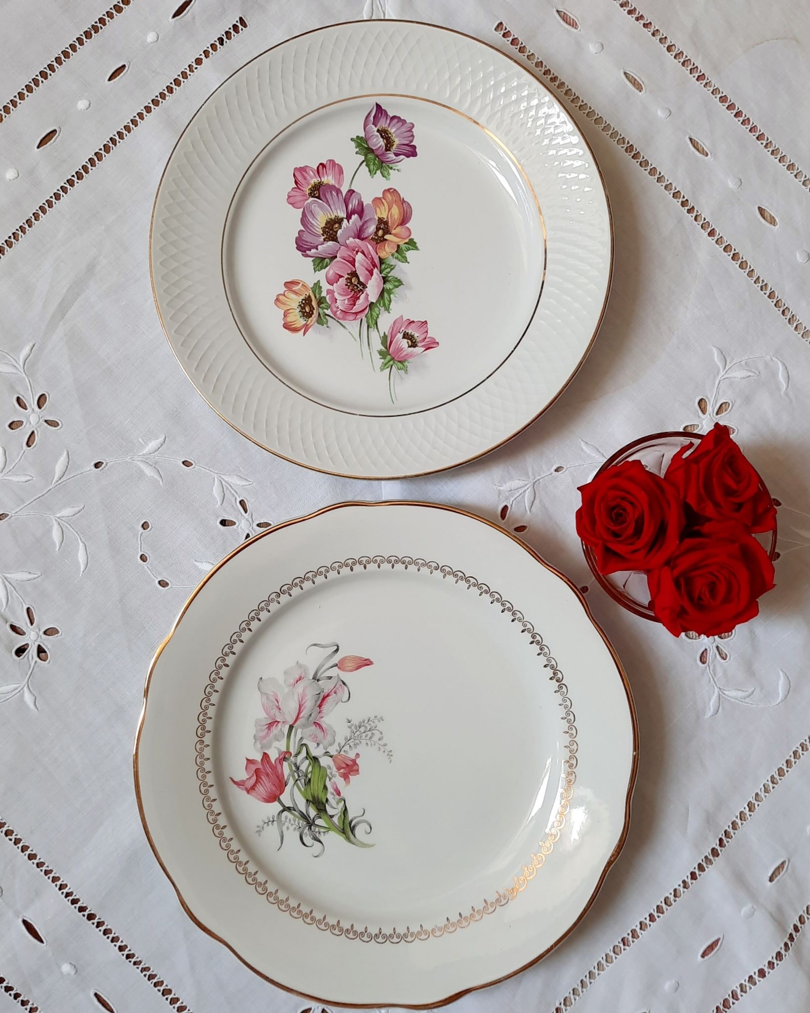 Flat antique earthenware plates with gilded edges