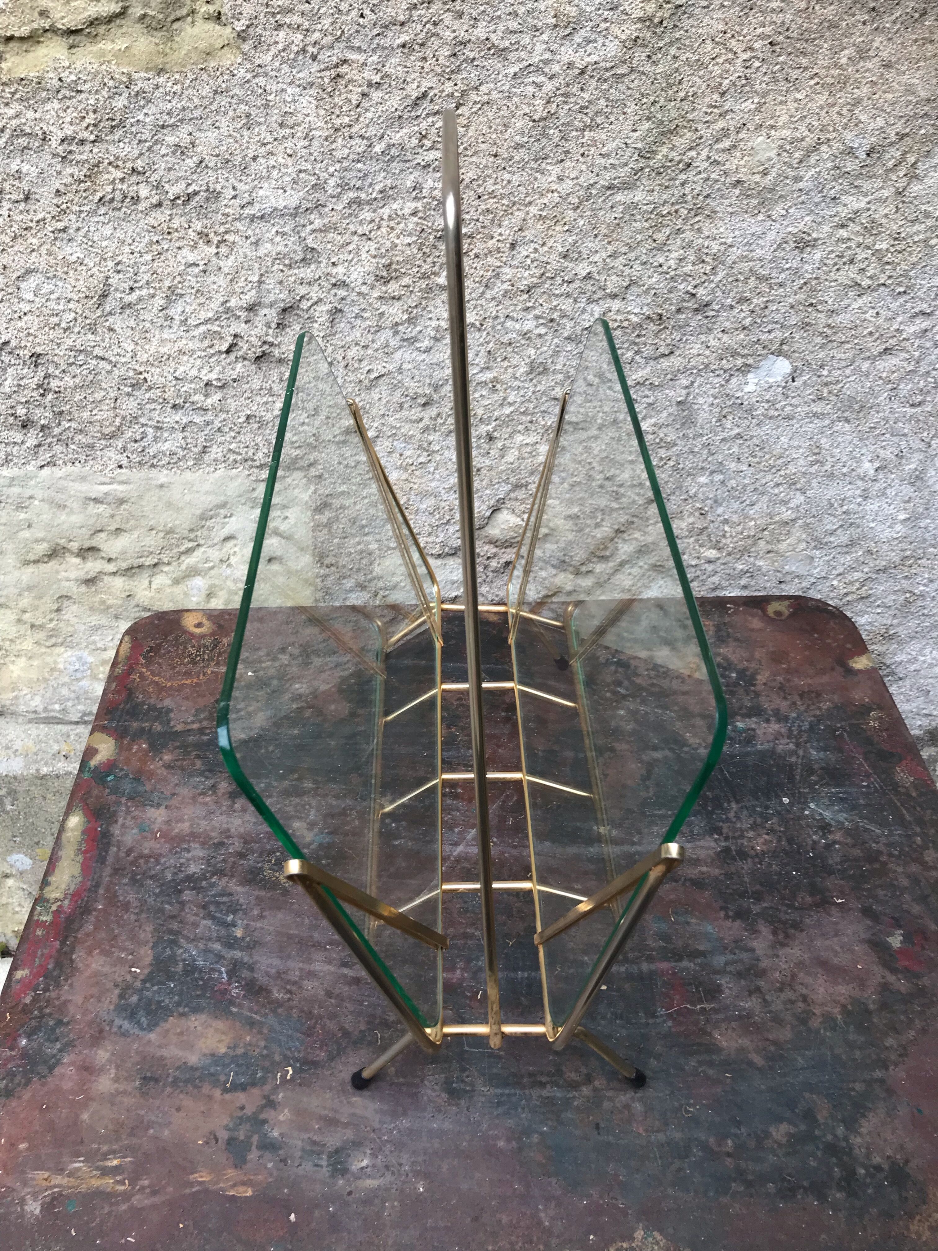 Glass and gold metal magazine door