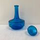 Vintage turquoise blue glass vase/decanter