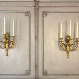 Pair of Louis XVI style wall sconces in gilded bronze, circa 1880.