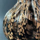 Vase signed in Murano Venice crystal with gold inclusion on a black background