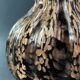 Vase signed in Murano Venice crystal with gold inclusion on a black background
