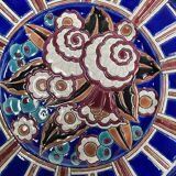 Plat en faïence polychrome de Longwy, vers 1930