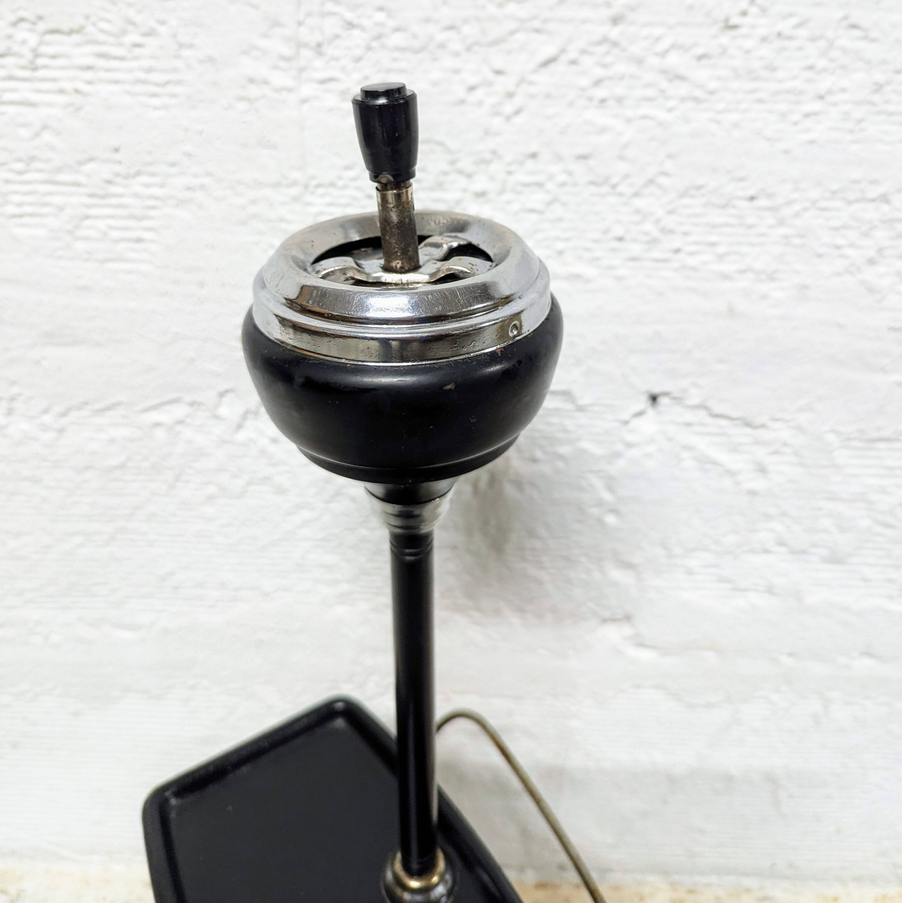 Standing ashtray with magazine rack