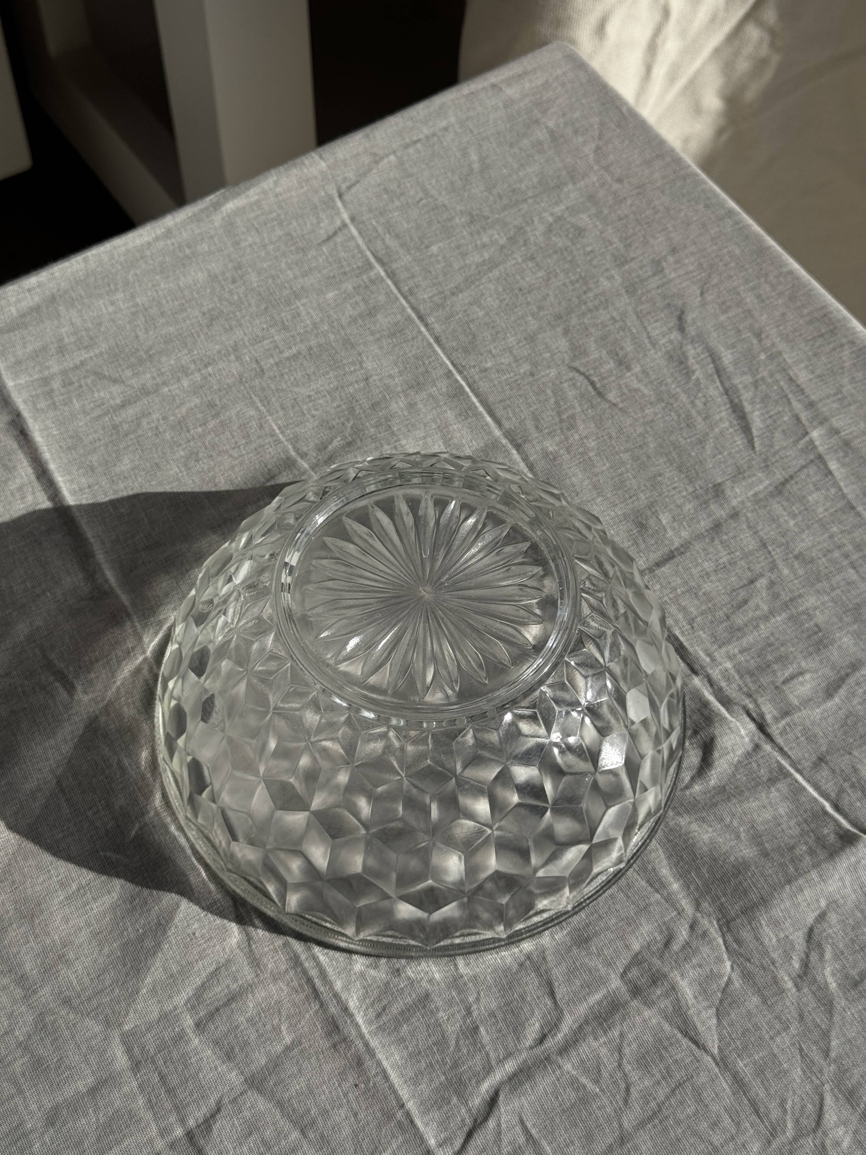 Small vintage glass bowl with a cube pattern.