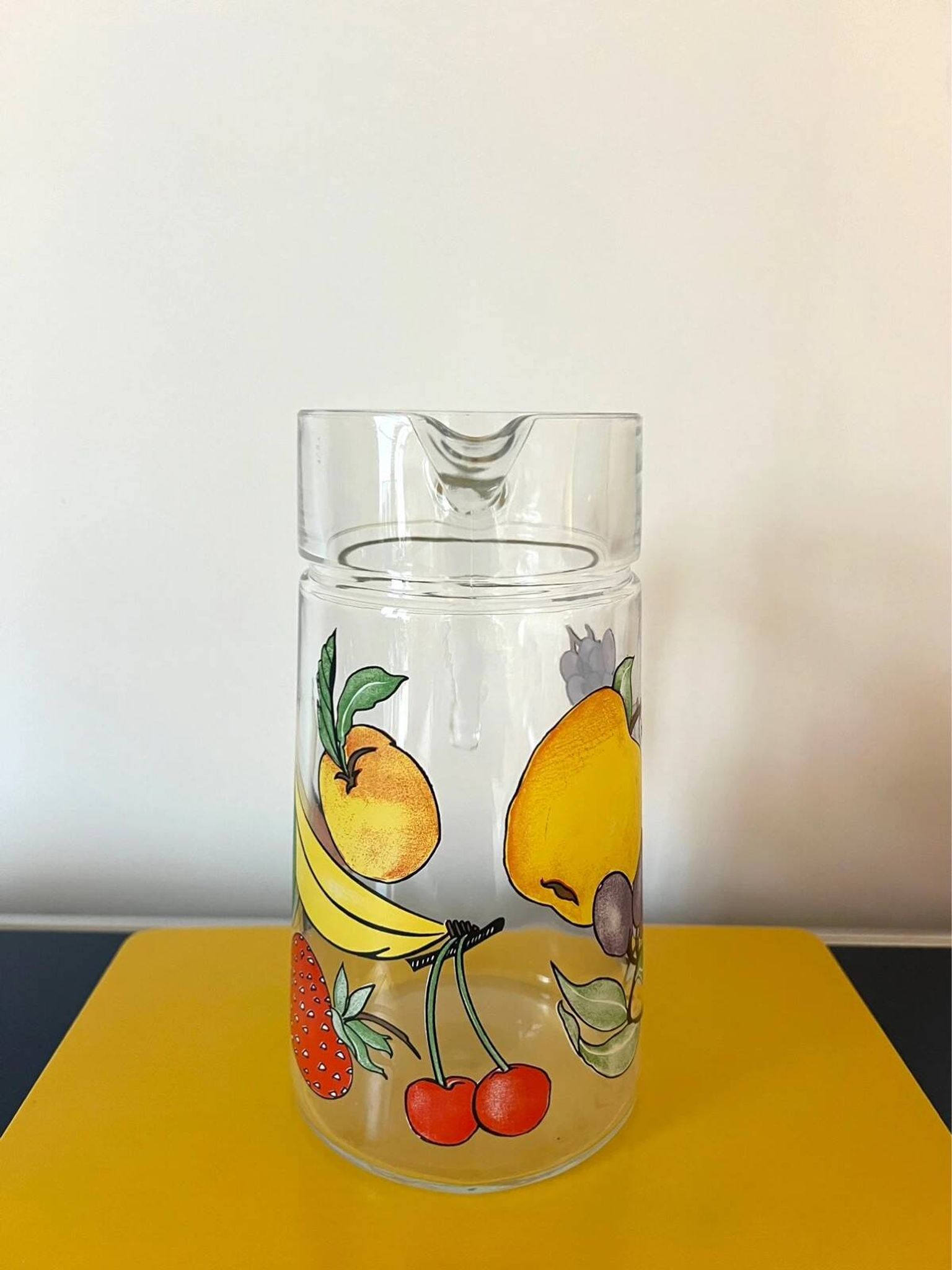 Vintage glass carafe with painted fruits