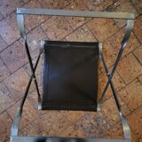 Folding steel and leather stool