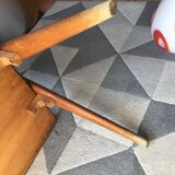 Double-footed red Formica wood spindles console