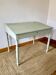 Antique wooden sloped desk, with a drop-down front and turned legs.