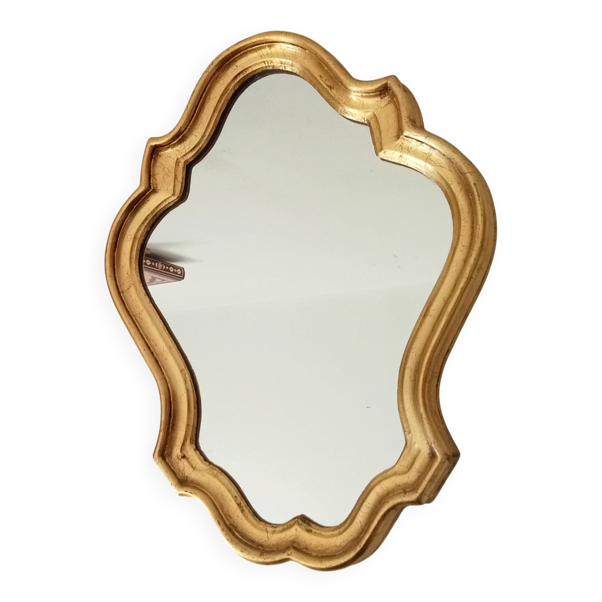 Baroque mirror in gilded wood from the 1960s.