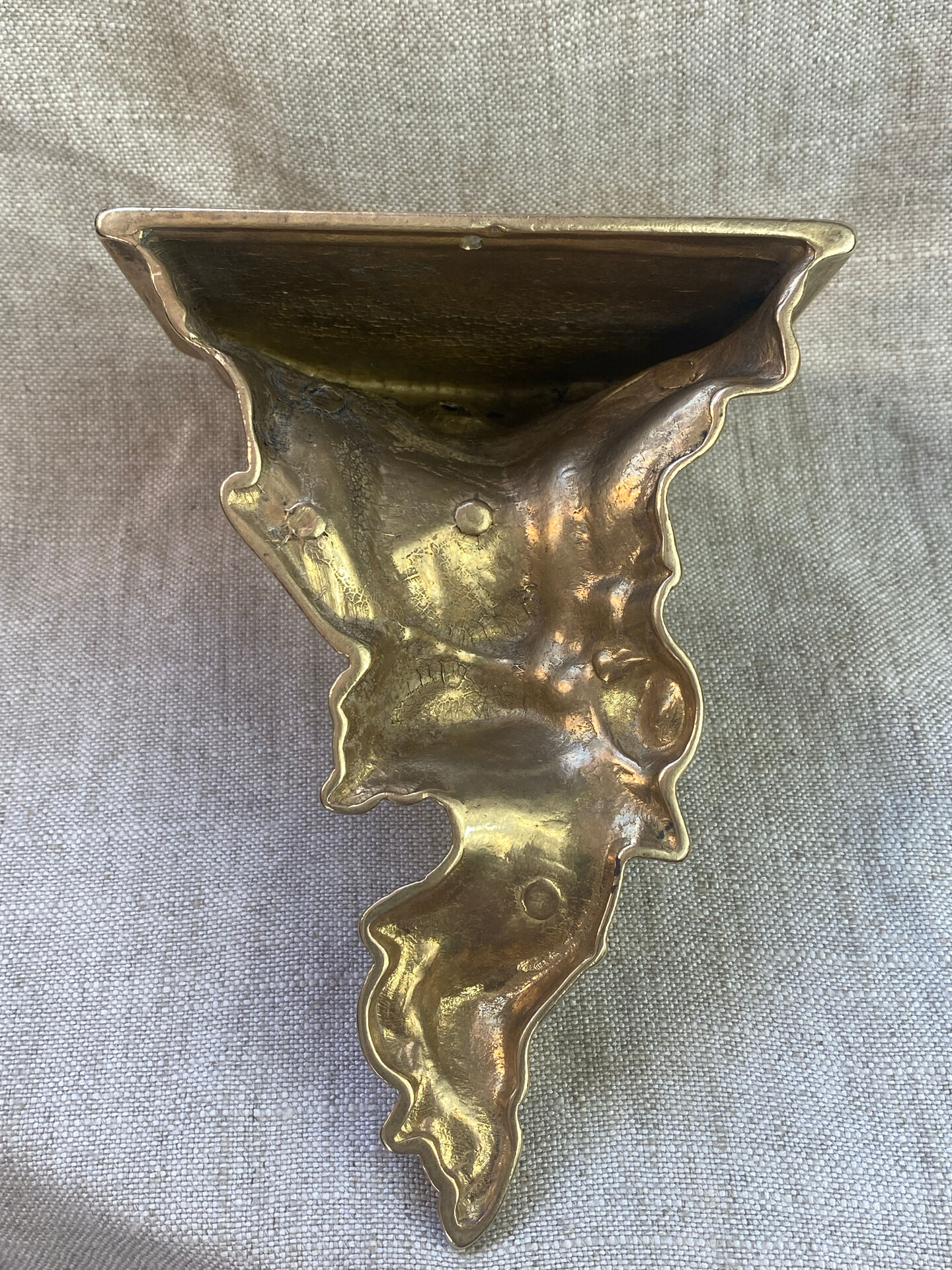 Small wall console in Rococo style in bronze