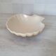 Brown and white ceramic shell bowl