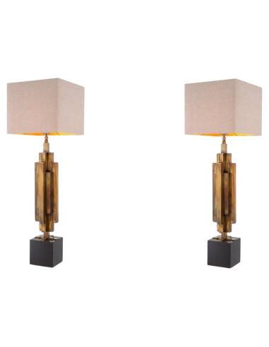 Pair of patinated brass table lamps, granite base, artistic design