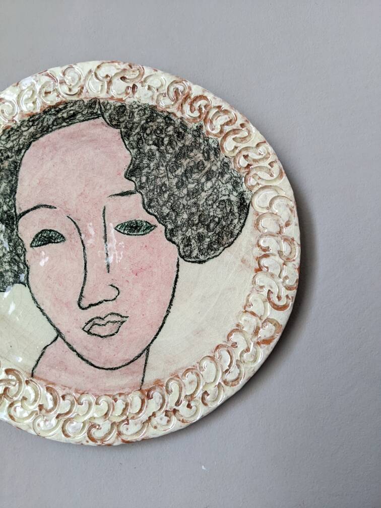 Handmade ceramic wall hanging portrait enameled medallion