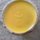 Old yellow porcelain pitcher stamped Saint Clément