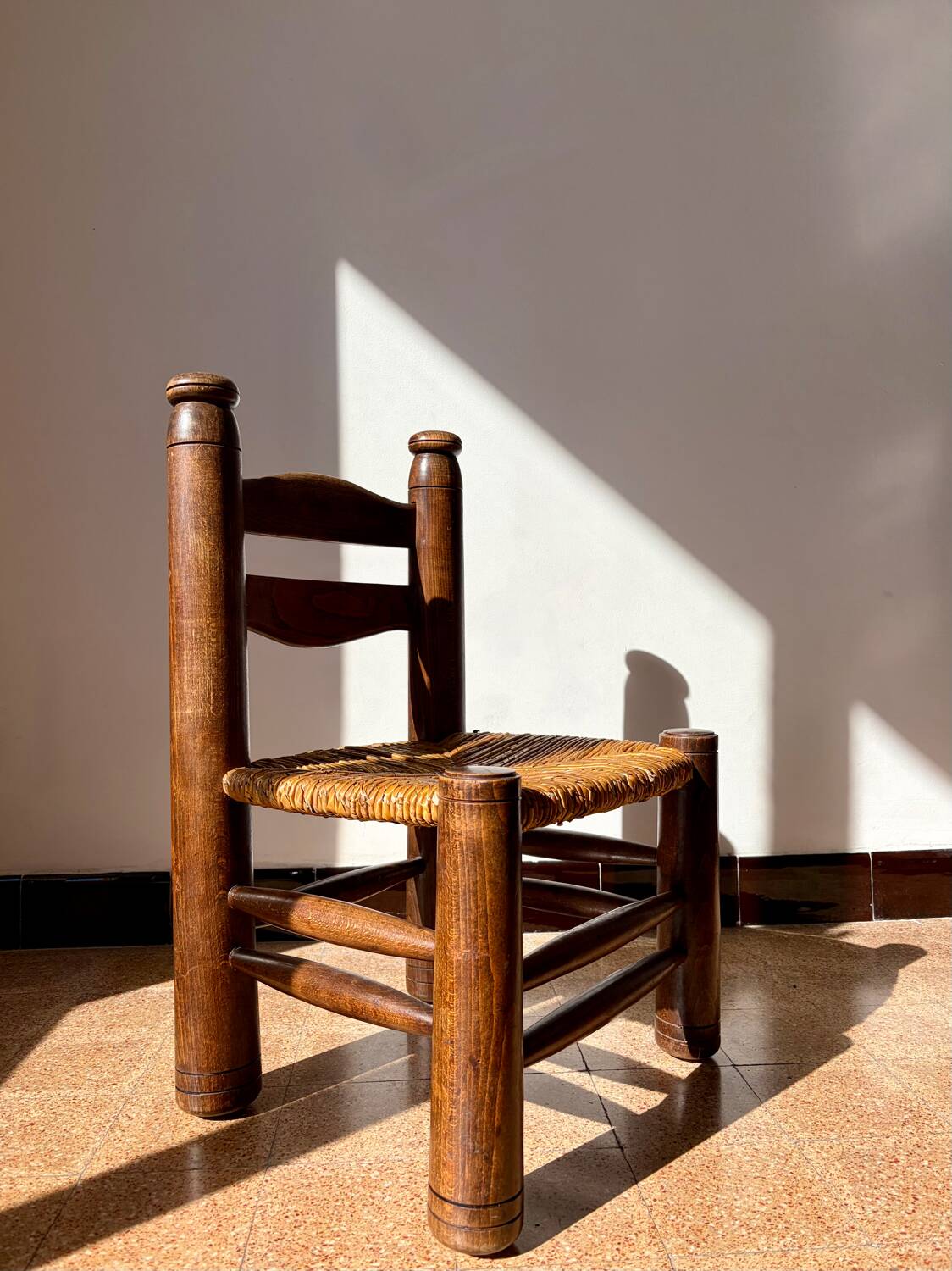 Low fireplace chair attributed to Charles Dudouyt.