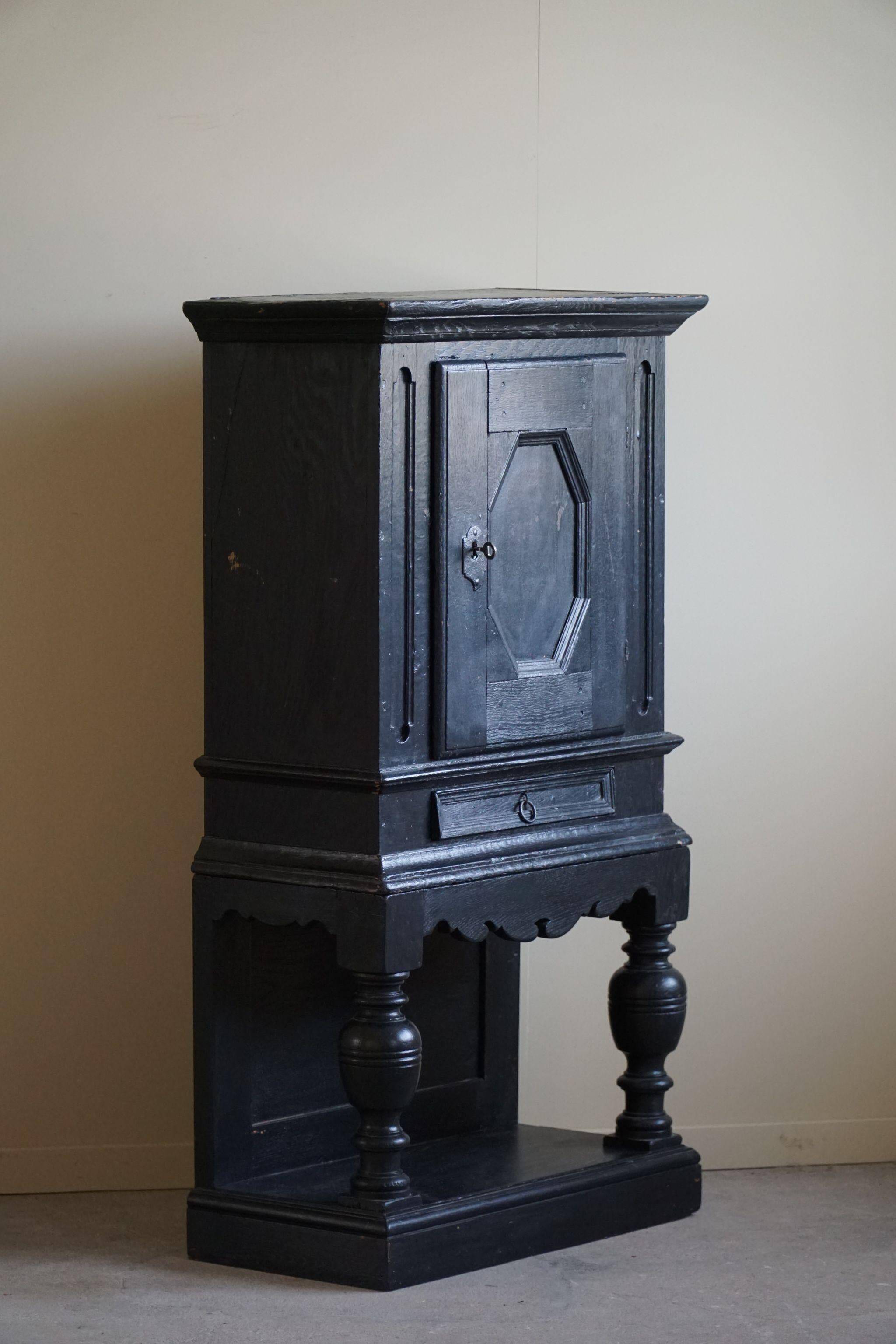 Antique black painted wardrobe from the 18th century by a Danish cabinetmaker, baroque.