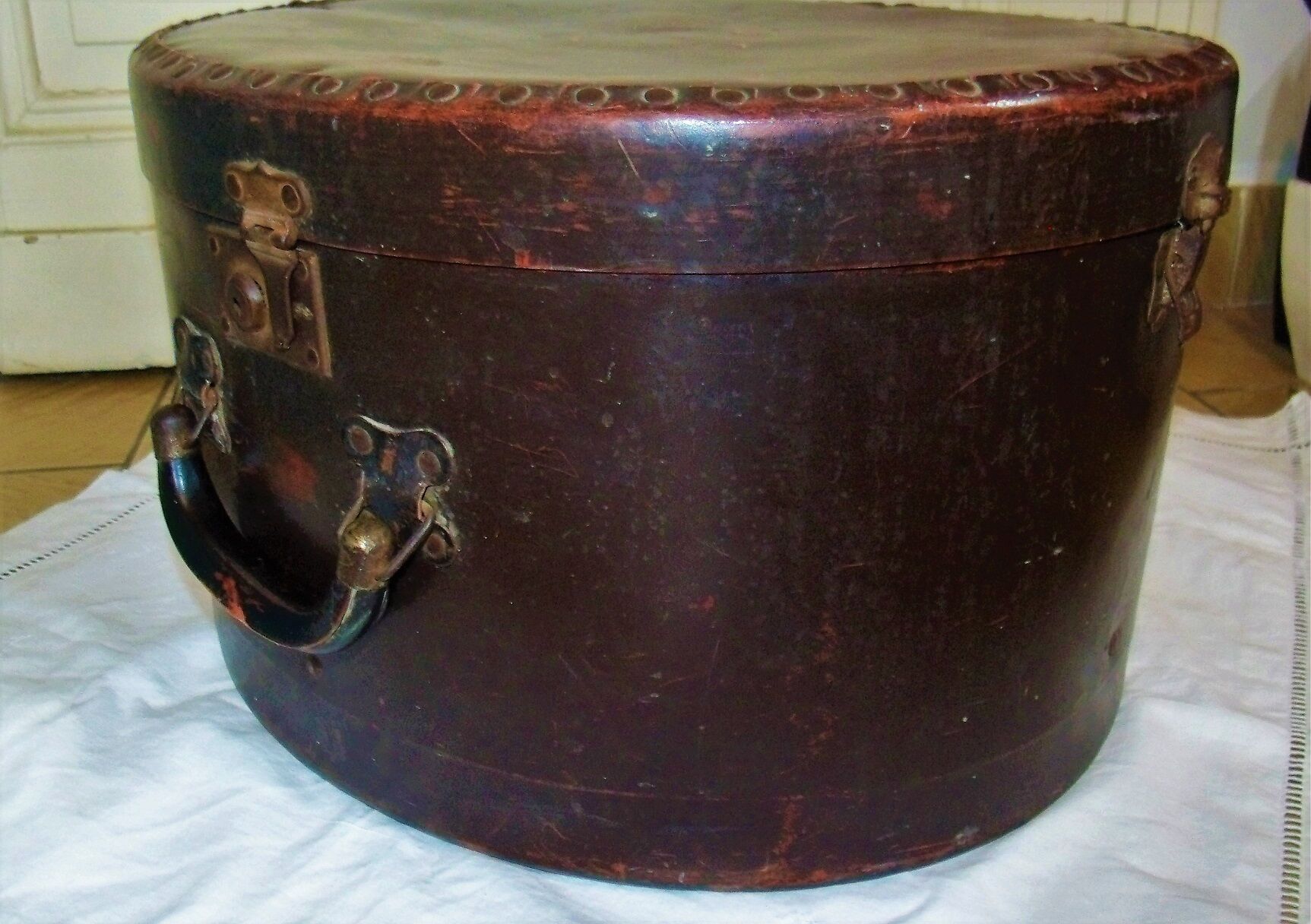 Studded old leather hat box