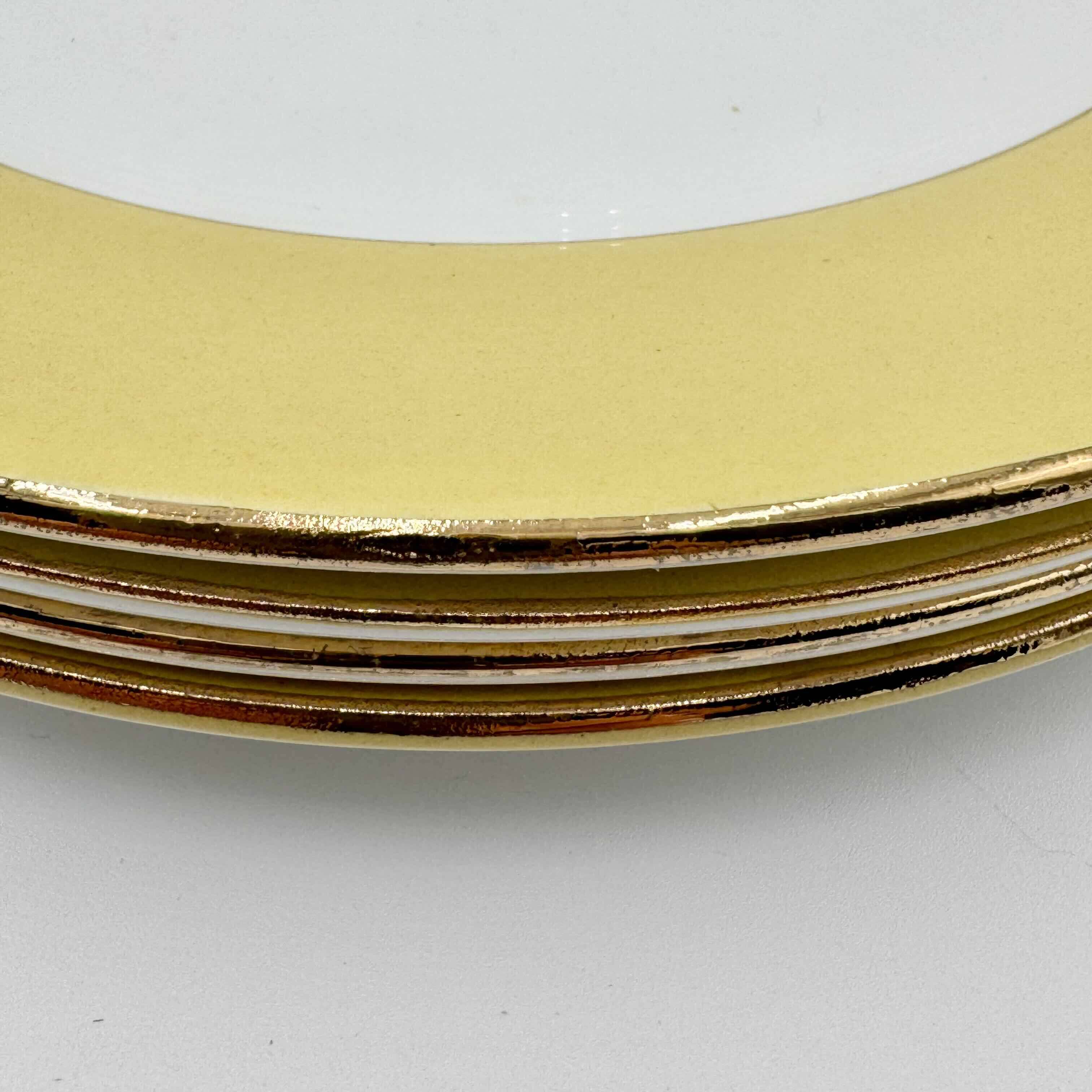Amandinoise dinner plates, yellow with gold rims