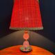 Small glass, mirror, and brass lamp from the 1960s.