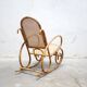 Fauteuil à bascule vintage en rotin et cannage