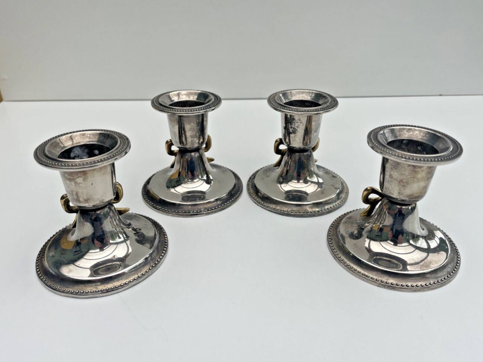 Set of 4 silver metal candle holders with gold bow - classic chic style