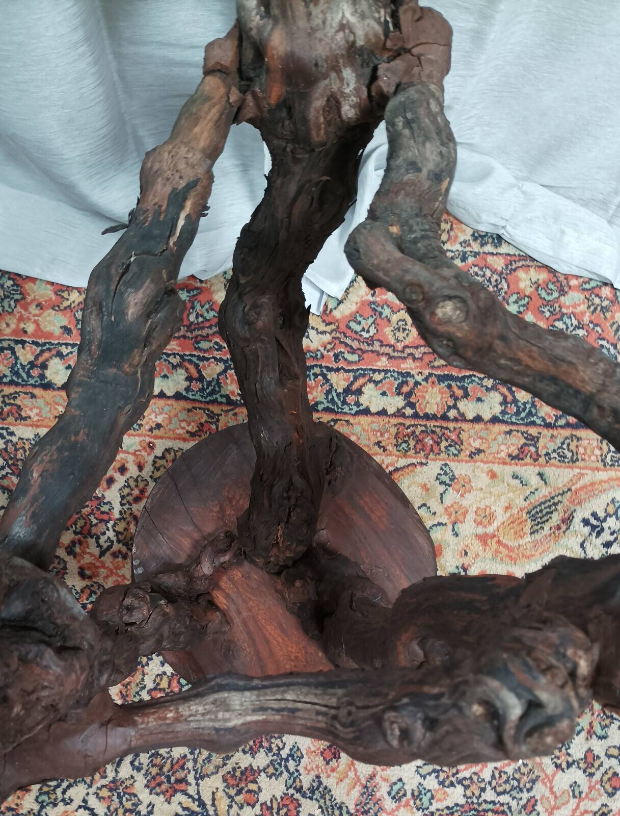 Brutalist bar stool made of vine wood