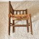 Vintage corner chair in turned oak and straw