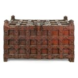 Large wooden and metal chest with red patina