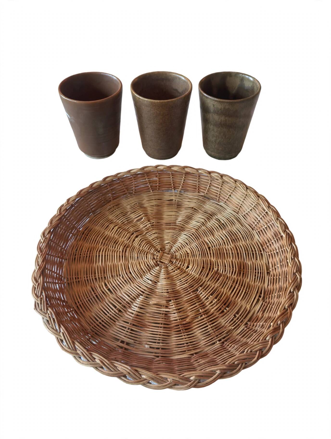 3 vintage 70s glazed stoneware cups and the wicker tray.