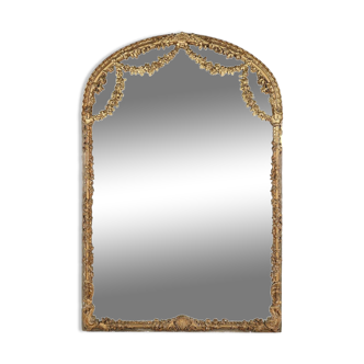 Large baroque decorated chimney mirror in gilted wood, France ca. 1800