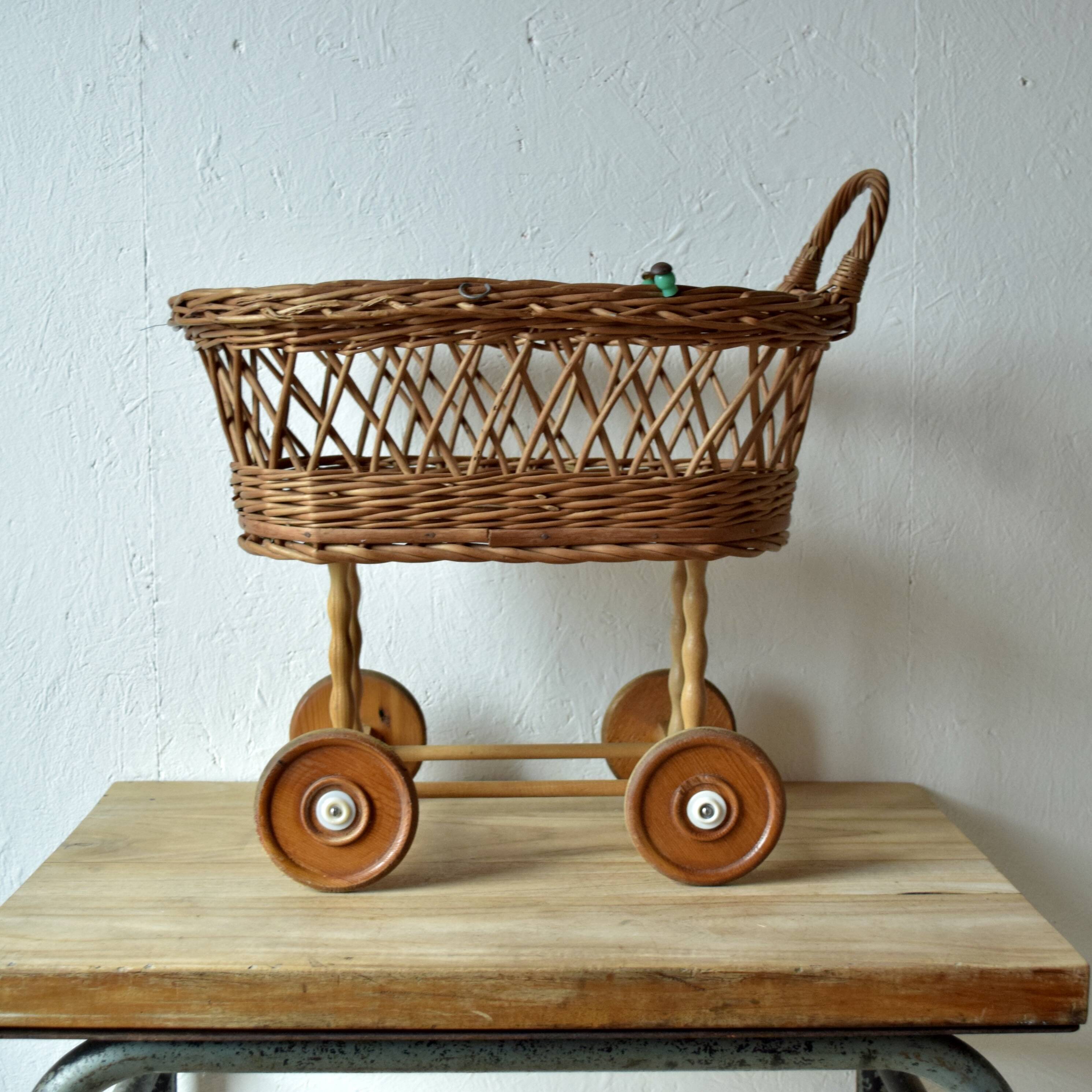 Old dolls pram - wooden wheels