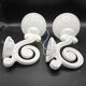 Pair of white enameled cast iron wall sconces, mid-20th century