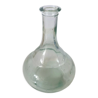 Very old bottle or flask made of molded glass