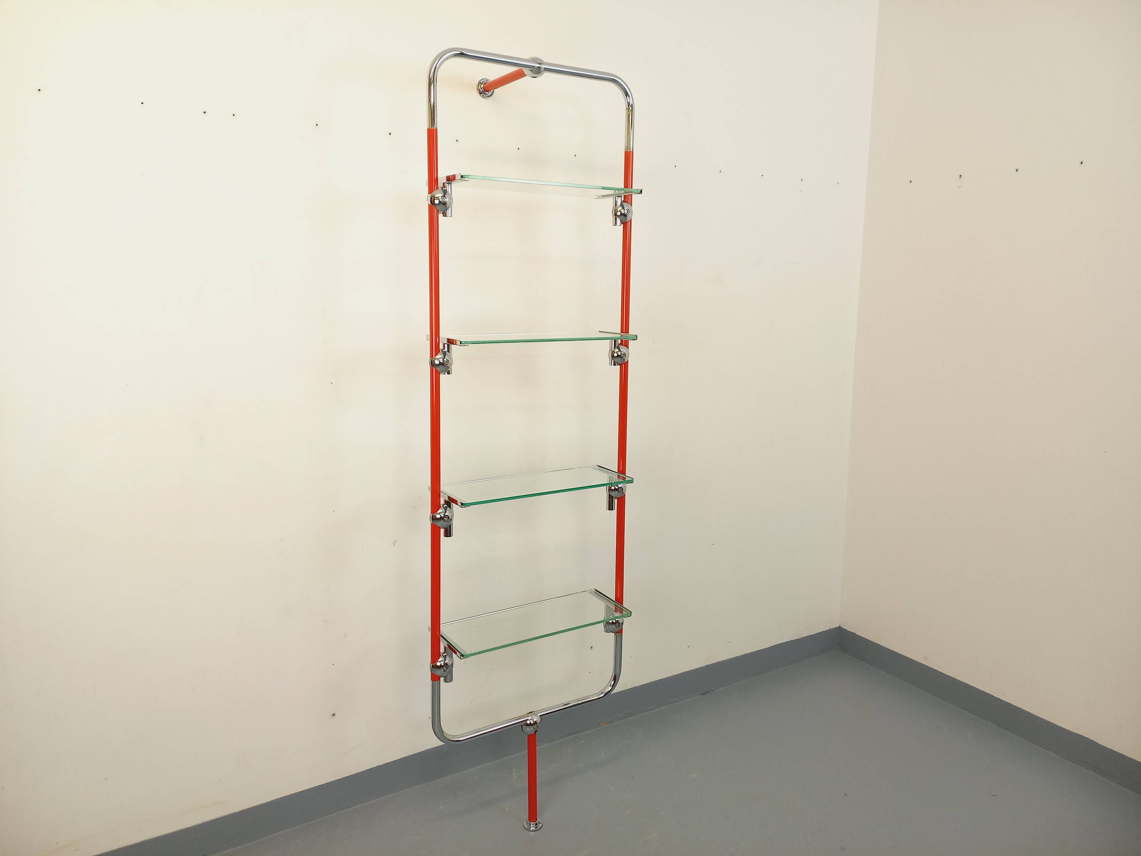 Modular bookshelf in vintage Bauhaus style, red metal, chrome.