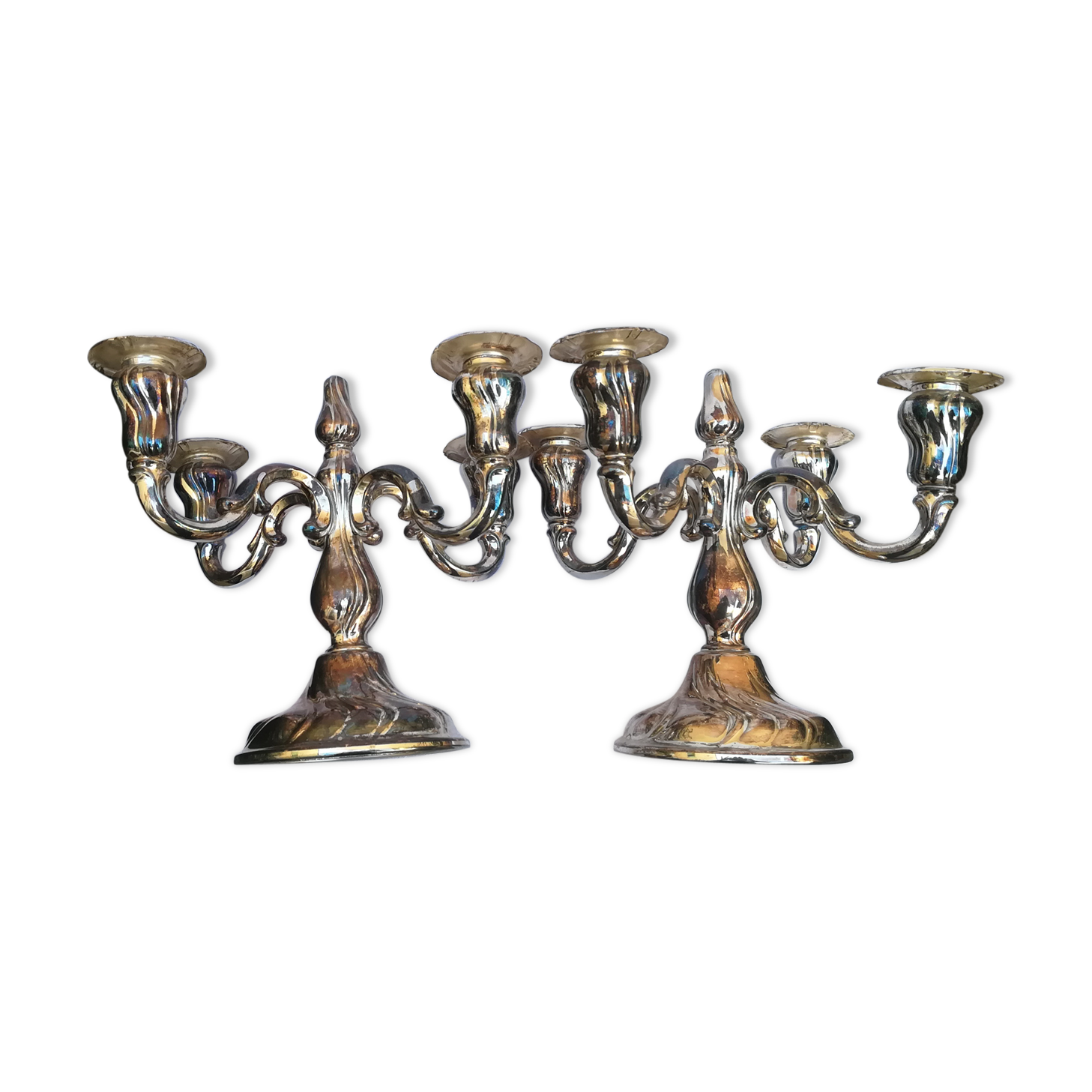 Pair of candlesticks in silver metal