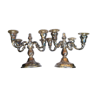 Pair of candlesticks in silver metal