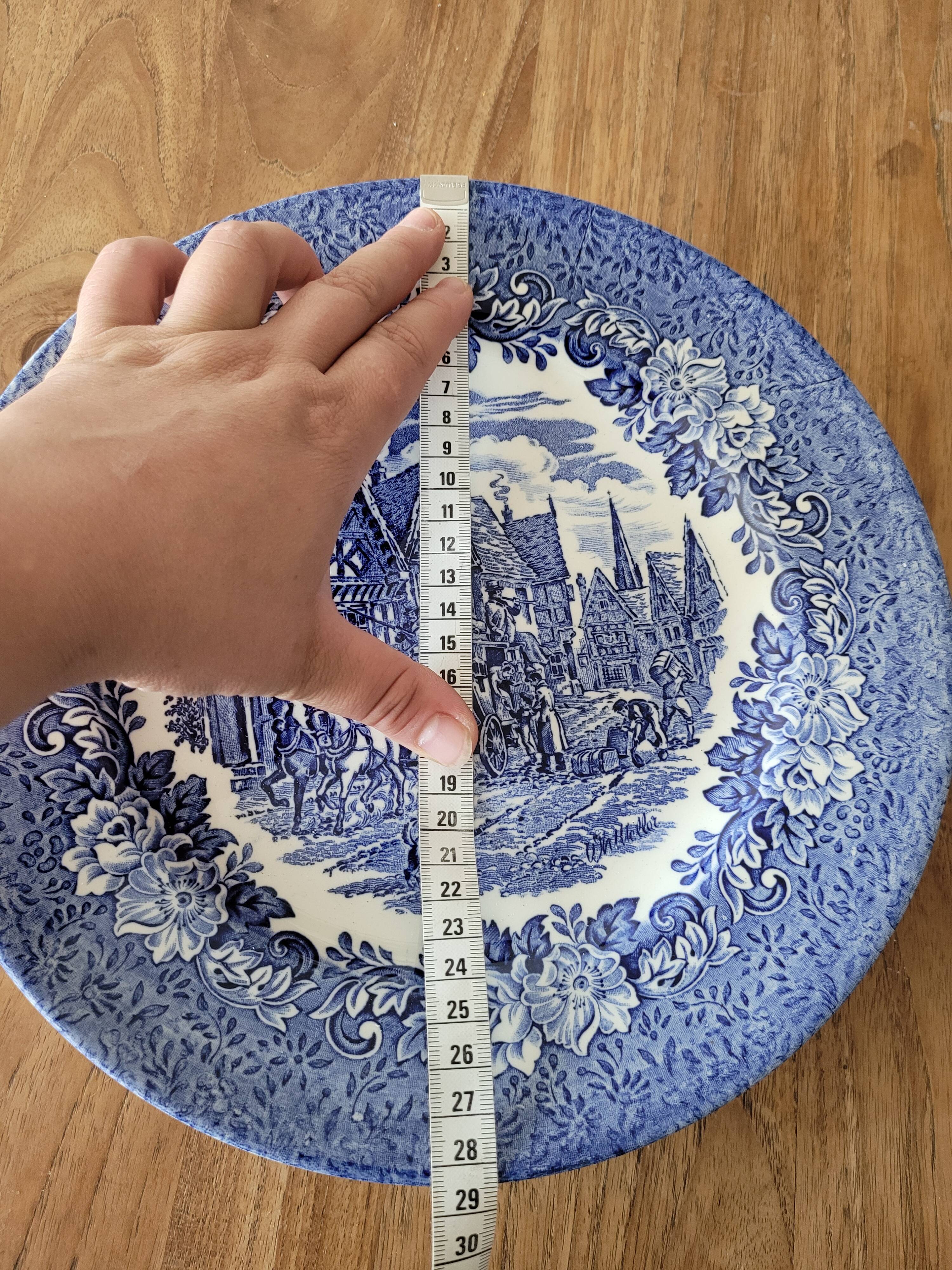 6 blue plates made in england