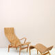 'Pernilla' armchair and footstool designed by Bruno Mathsson