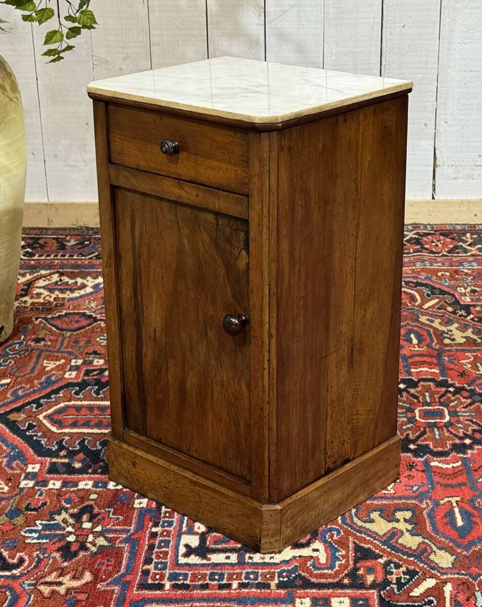 Nightstand in walnut with a white marble top, 19th century.
