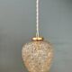 Suspension globe vintage en verre moulé ambré