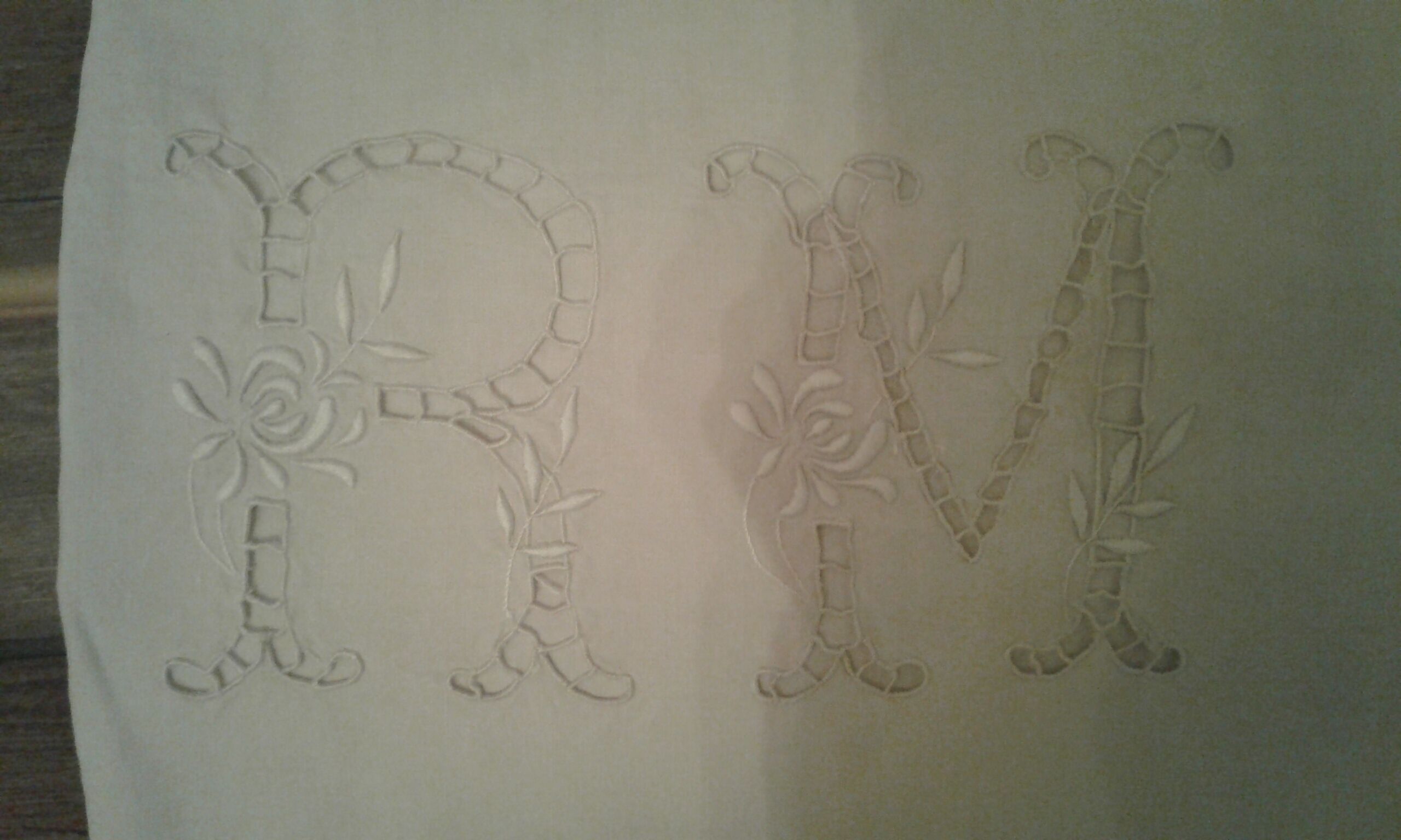 Old Lin Drap. Monogram embroidered and opened R M and 3 lines day
