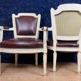 Pair of Louis XVI cabriolet armchairs in lacquered wood and leather circa 1850